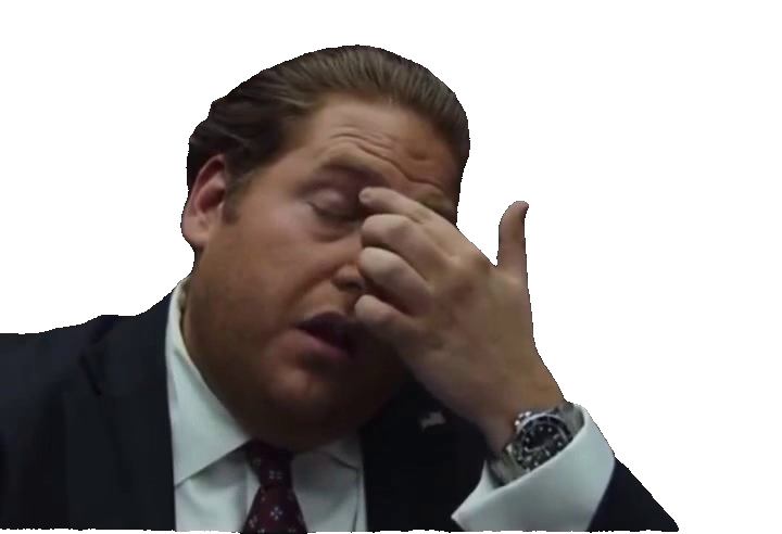 man-in-suit-rubbing-eyes-saying-heavyset-man-in-suit