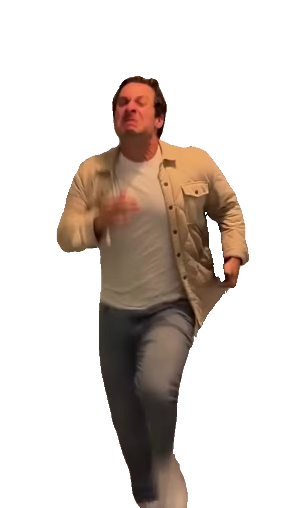 man-sprinting-down-office-hallwa-man-in-cream-jacket-runn