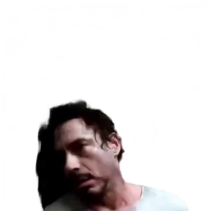 tony-stark-staring-in-cave-bearded-man-in-white-shi